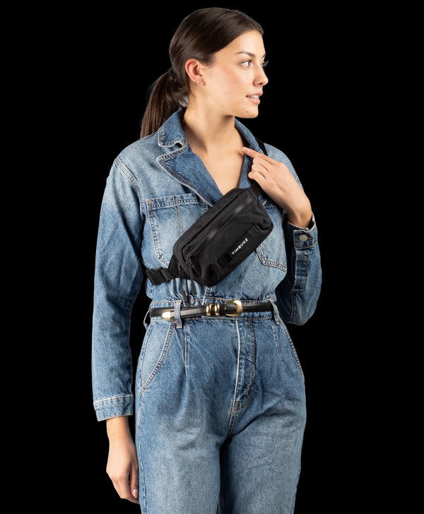 https://www.timbuk2.com/cdn/shop/products/timbuk2-rascal-belt-bag-accessories-eco-black-3950-3-1068-on-body-female-2_5_600x.progressive.png.jpg?v=1662583908